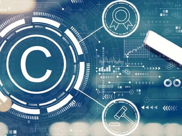 Digital illustration of a large copyright symbol (C) surrounded by futuristic circular graphics, with icons of a legal gavel and an award ribbon, overlaid on a background of data charts and graphs.