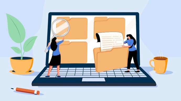 Illustration of two women interacting with giant digital folders displayed on a large laptop screen, one holding a magnifying glass over a folder and the other pulling a document from a folder, with a potted plant, a pencil, and a steaming cup of coffee placed around the laptop on a light background