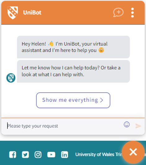 Screenshot of a virtual assistant chat window named UniBot, greeting a user named Helen and offering help, with a text input area and a button labeled 'Show me everything'; social media icons and part of University of Wales Trinity Saint David branding are visible below the chat window.